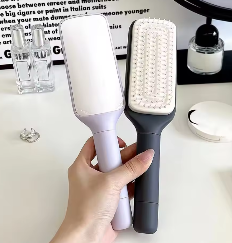 AuraCharm Retractable Hairbrush